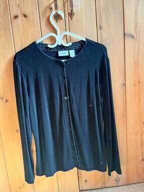 Buttoned black top.
